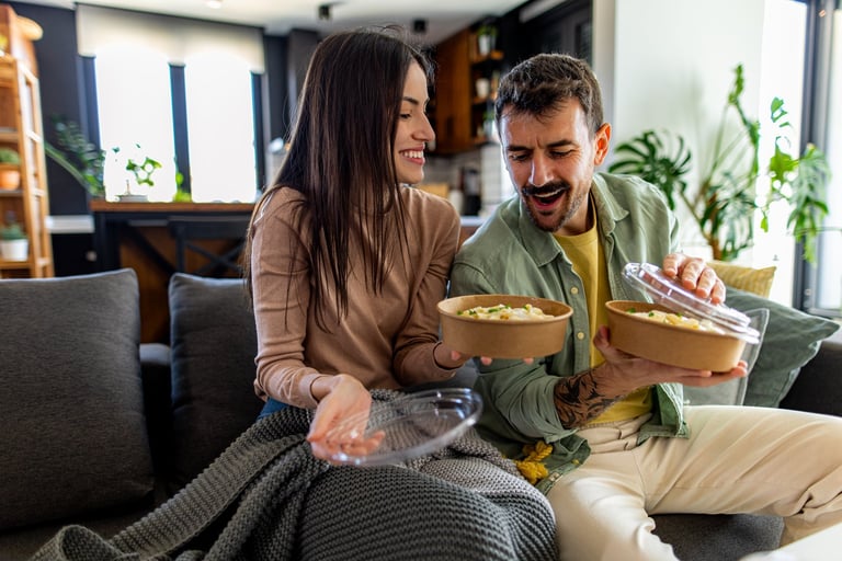 Happy couple with takeout
